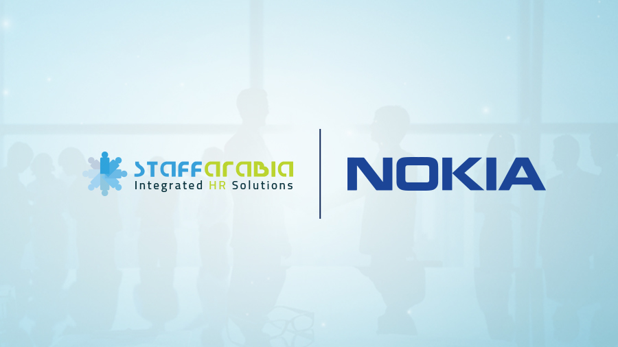 Staff Arabia celebrating business collaboration deal with Nokia 