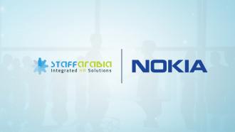 Staff Arabia celebrating business collaboration deal with Nokia 
